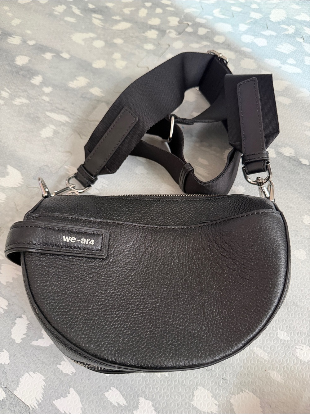 WE-AR4 The Half Moon Grained-Leather Cross-Body Bag